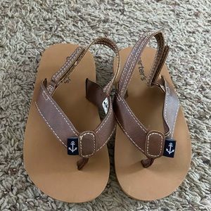 Carter’s flip flops with strap. NWOT. New, never worn.